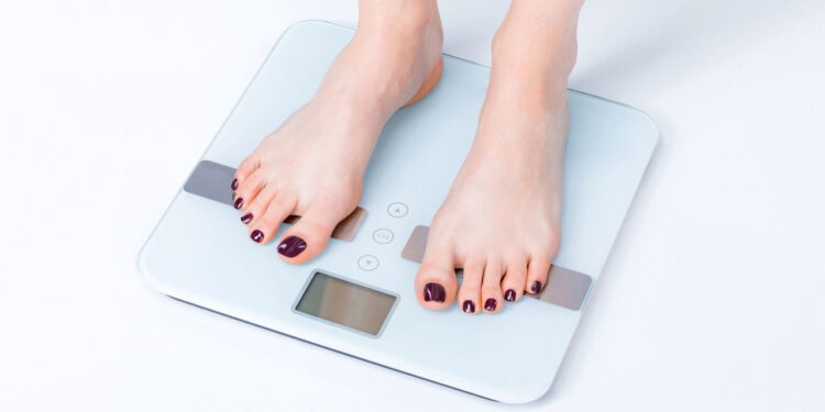 Transformação corporal com perda de 50 kg por meio de hábitos consistentes