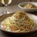 Como preparar macarrão alho e óleo cremoso com manteiga e parmesão, uma alternativa rápida e deliciosa para o jantar em família fugir do tradicional