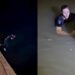 Rapaz pula de ponte alta para salvar cachorro que se afogava em rio