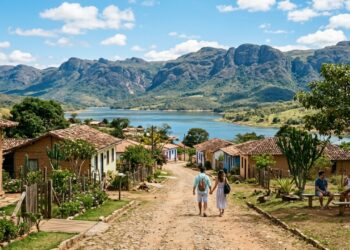 Vasta extensão verde e represa imponente ao pé da montanha: este vilarejo rústico atrai adeptos do turismo de aventura