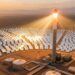 Milhares de espelhos refletem luz solar para uma torre no deserto do Marrocos.