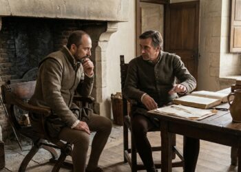 Montaigne e La Boétie conversam em um ambiente tranquilo que sugere confiança e afinidade profunda.