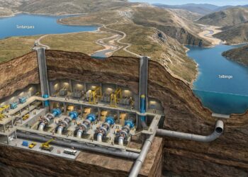 Corte da montanha revela uma grande usina subterrânea conectando dois reservatórios por túneis.